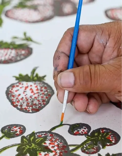 Finishing details on a hand-printed fabric
