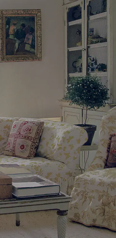 Sunlit interior with hand-printed textiles and classic furnishings